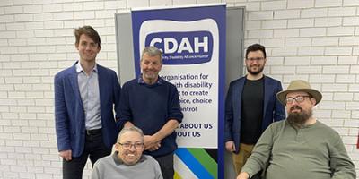 5 people next to a CDAH banner