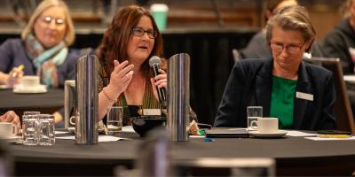 Speakers at a roundtable